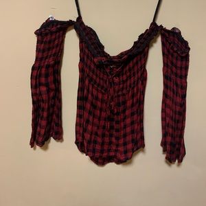 Very cute lace up front , with flare arms